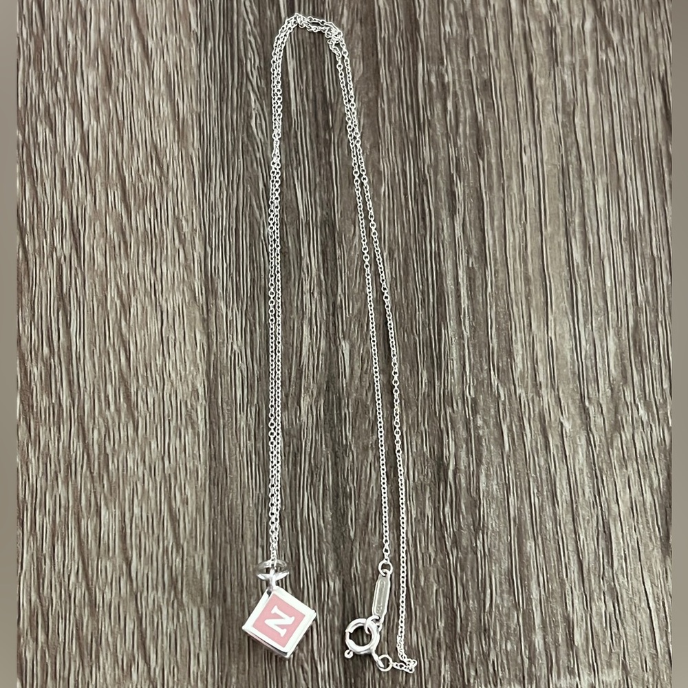 Necklace with‎ cube charm, with 18 inch chain